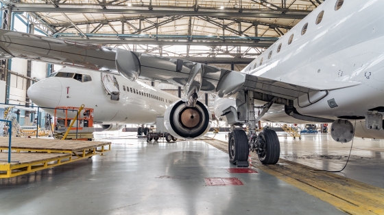 Aircraft inside a hangar maintained by aerospace parts manufacturers in India.