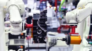 Robotic systems in quality inspect parts on an assembly line, ensuring precision in manufacturing.